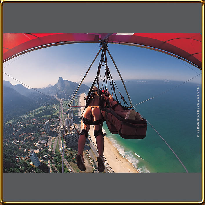 Naked couple on hang-glider