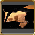 Aerial photo of helicopter cockpit with pilot flying over offshore oil rig. Bacia de Campos